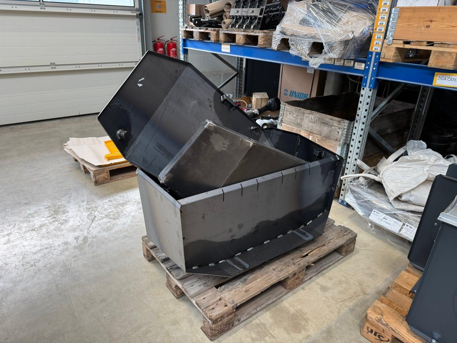 Unibox prototype opened on a pallet in the workshop