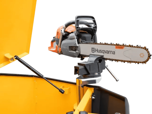 Chainsaw held by the vice built into the Unibox base