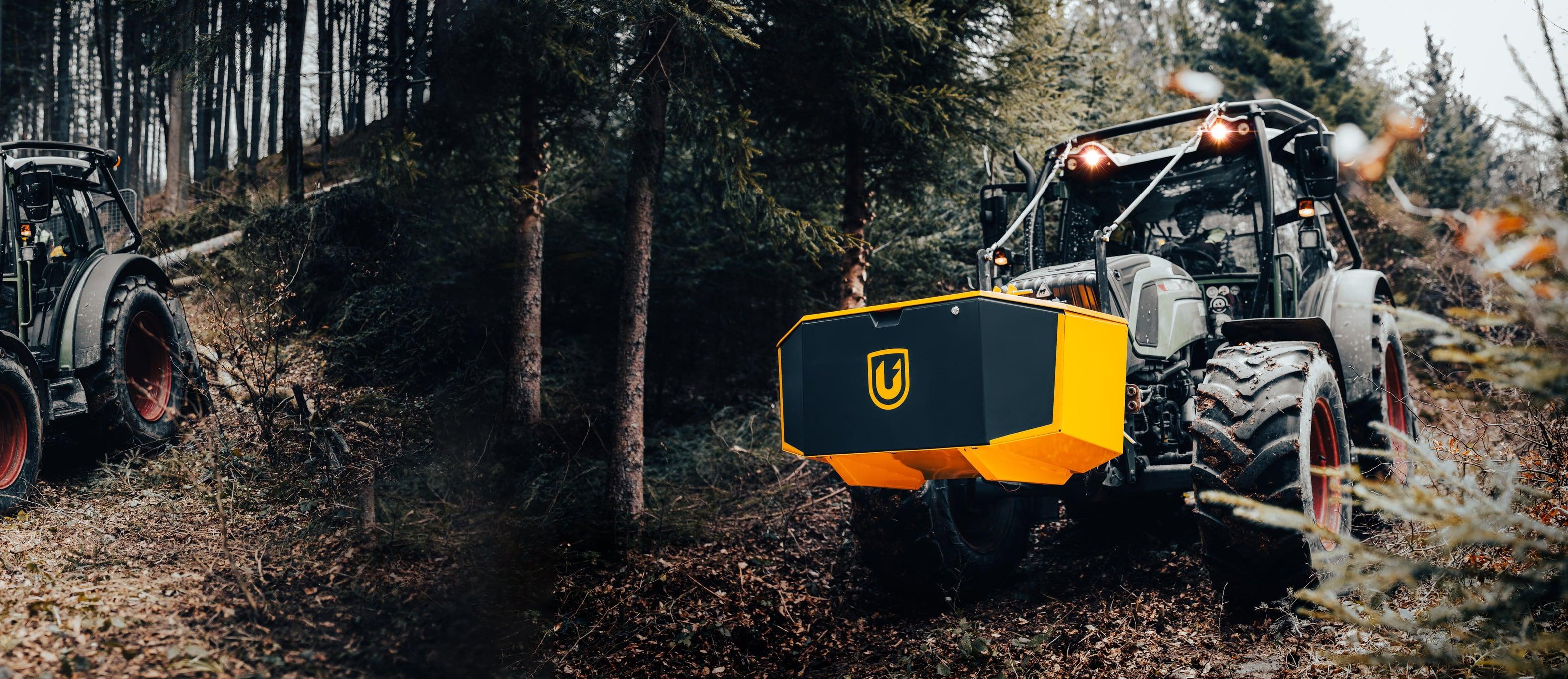 Unibox on a tractor in a winter forest
