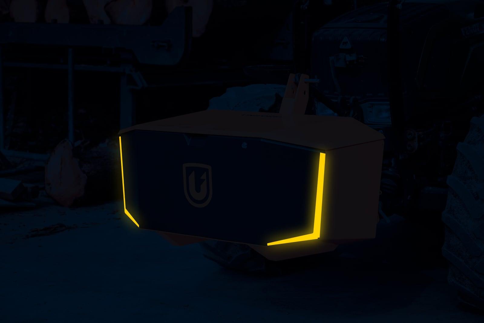 Unibox at night with reflective safety graphics glowing