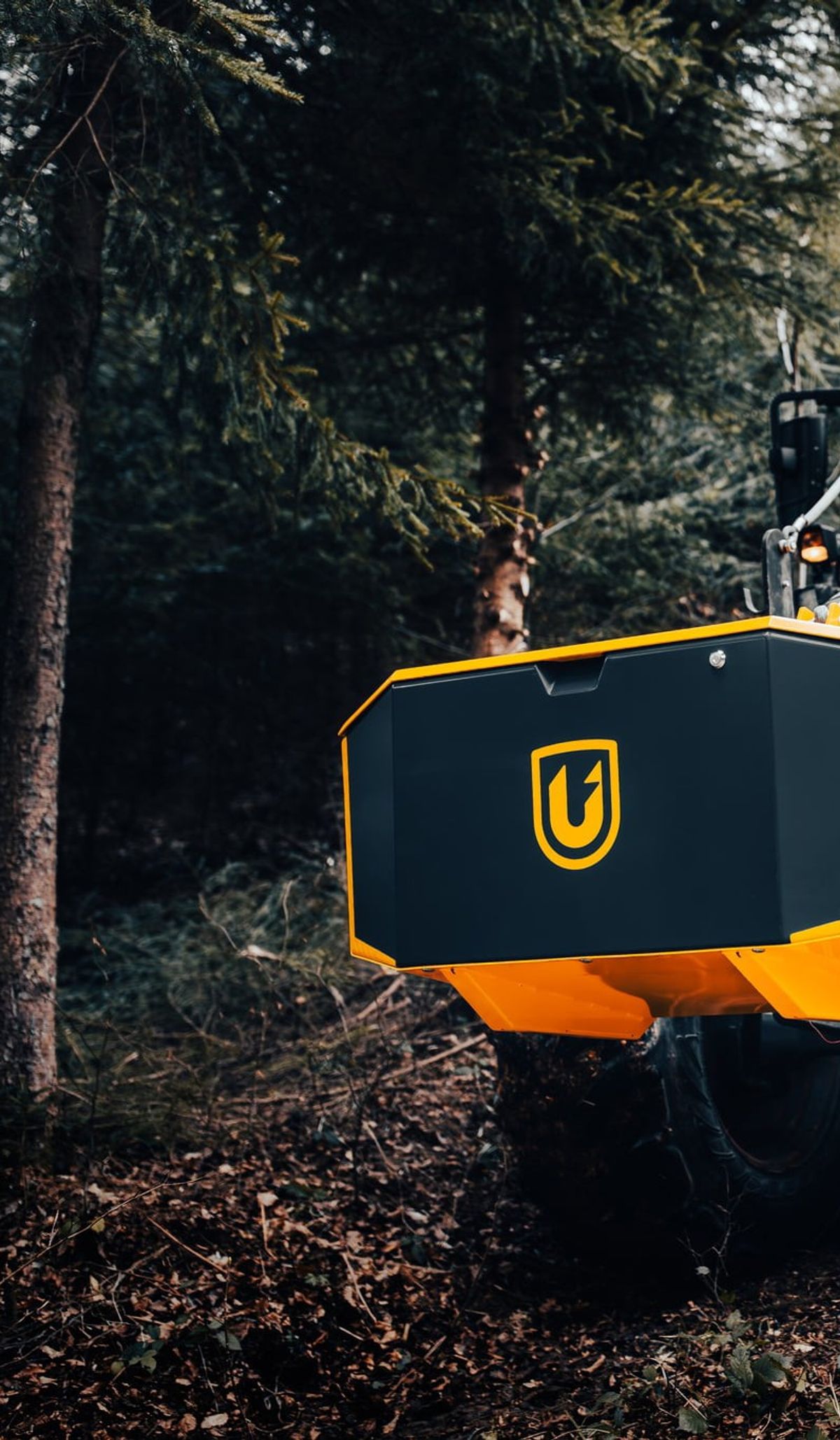 Unibox on a tractor in a winter forest